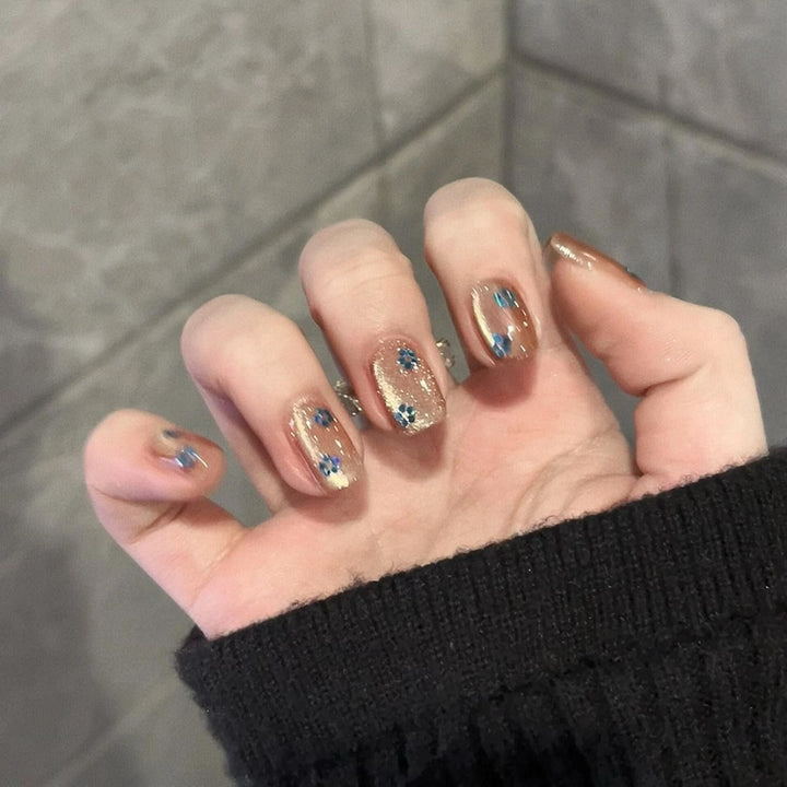 Glittering artificial nails with floral design Bowlift