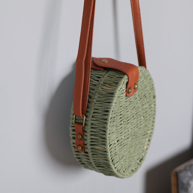 Round basket bag with leather accents Bowlift