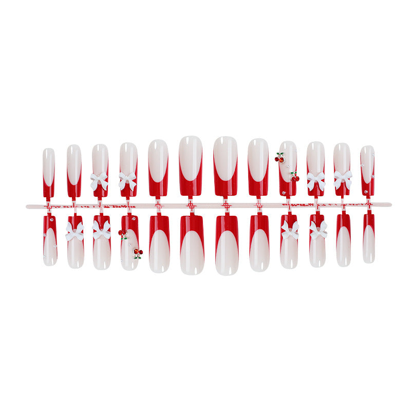 Creative nail set with festive cherry motifs Bowlift