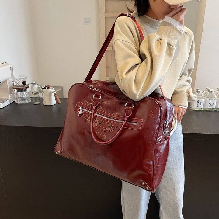 Luxurious Vintage-Inspired Leather Duffel Bag Bowlift