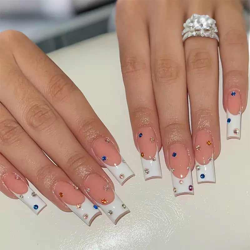 Artificial nails with sparkling rhinestone accents Bowlift