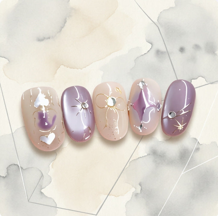 Artificial nails with playful bow and star design Bowlift