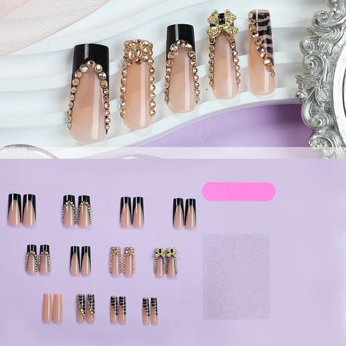 Acrylic nail set with glamorous 3D bows and radiant rhinestone decorations Bowlift