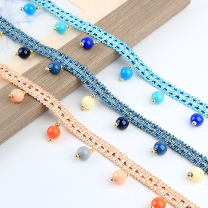Decorative lace trim with colorful pendants Bowlift