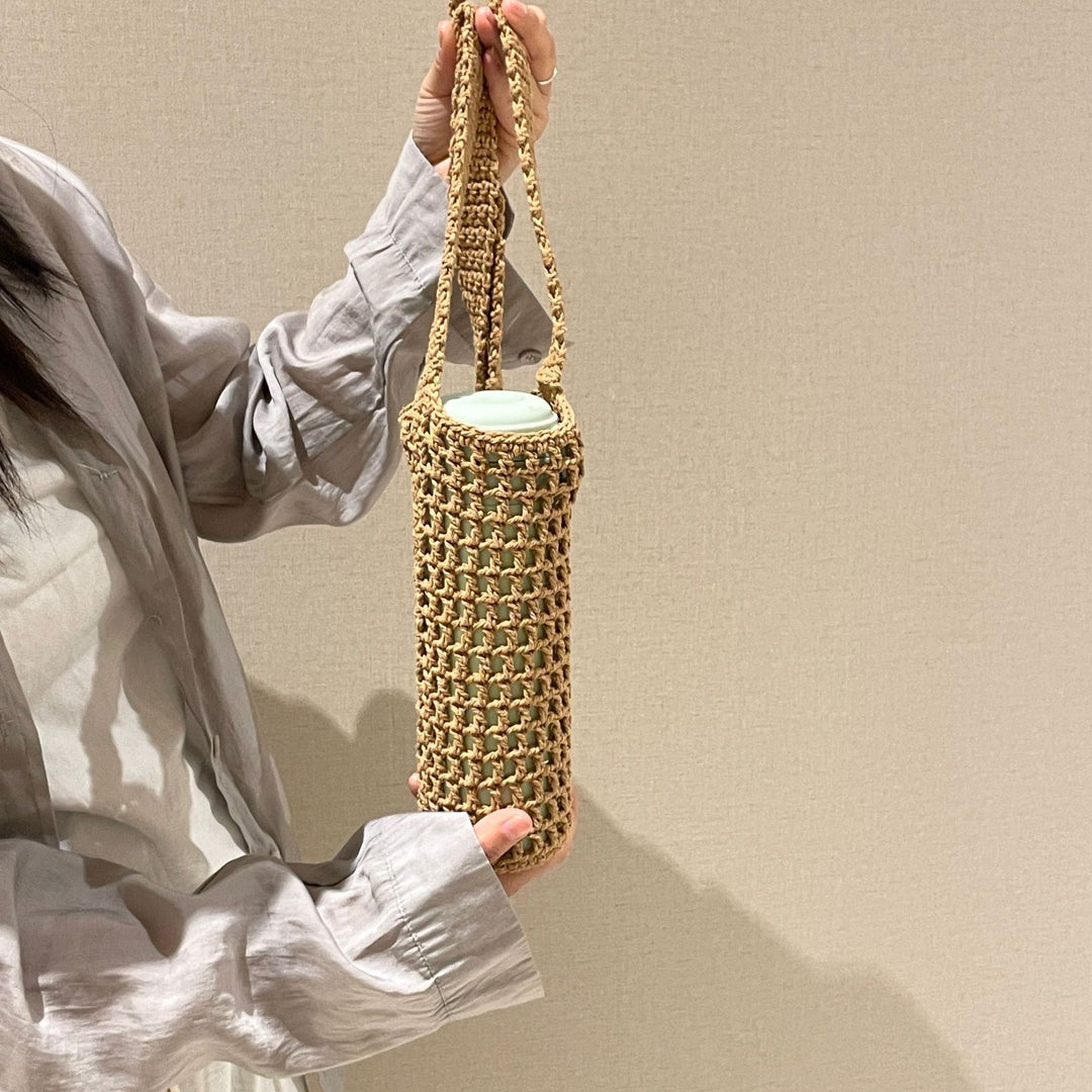 Hand-knotted bottle carrier Bowlift