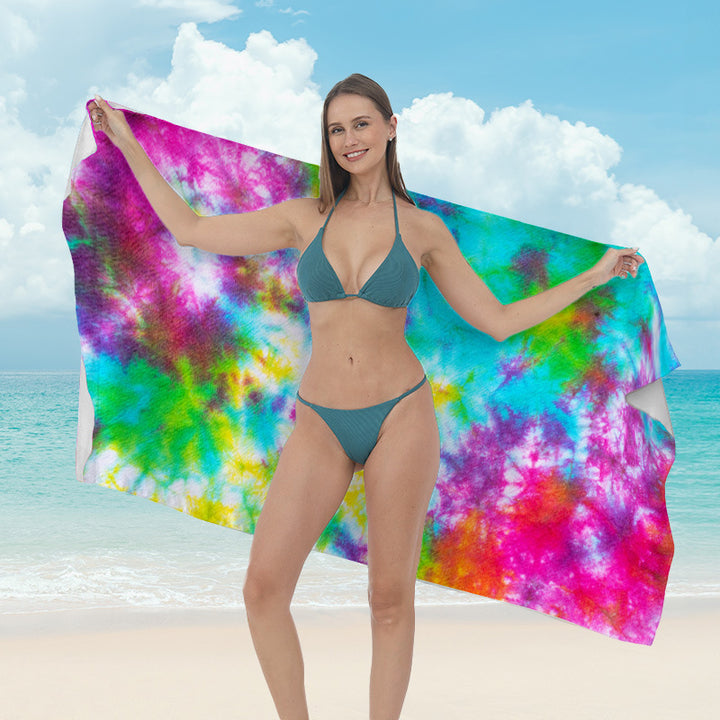 Beach towel with vibrant tropical plant motif Bowlift