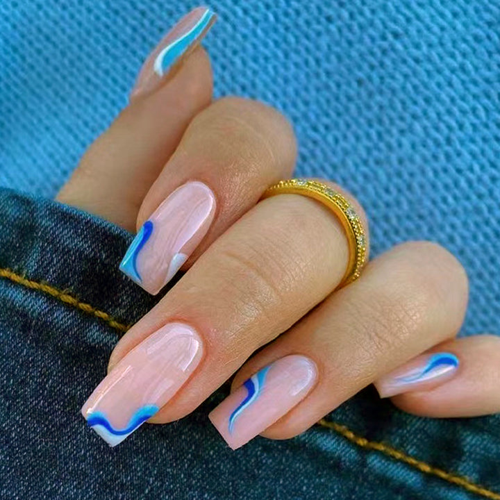 Trendy artificial nails with abstract wave pattern Bowlift