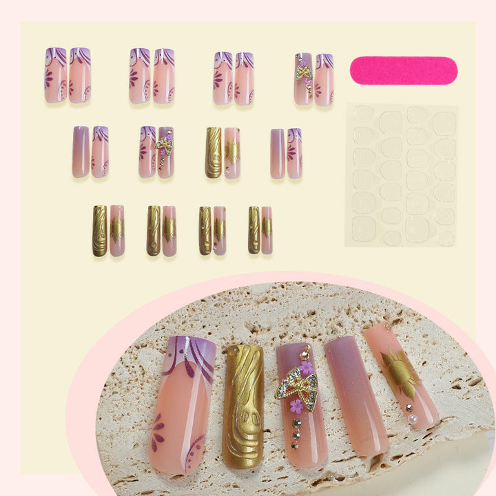 Artificial nail set with delicate flower and glitter accents Bowlift