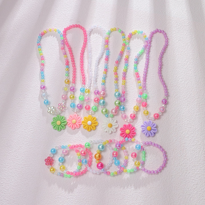 Playful jewelry set with flower pendant Bowlift