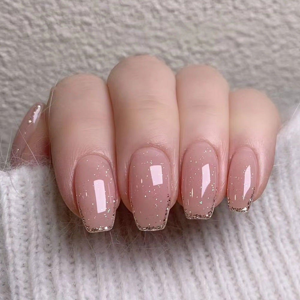 Artistic Nail Extensions with Elegant Glitter Finish Bowlift
