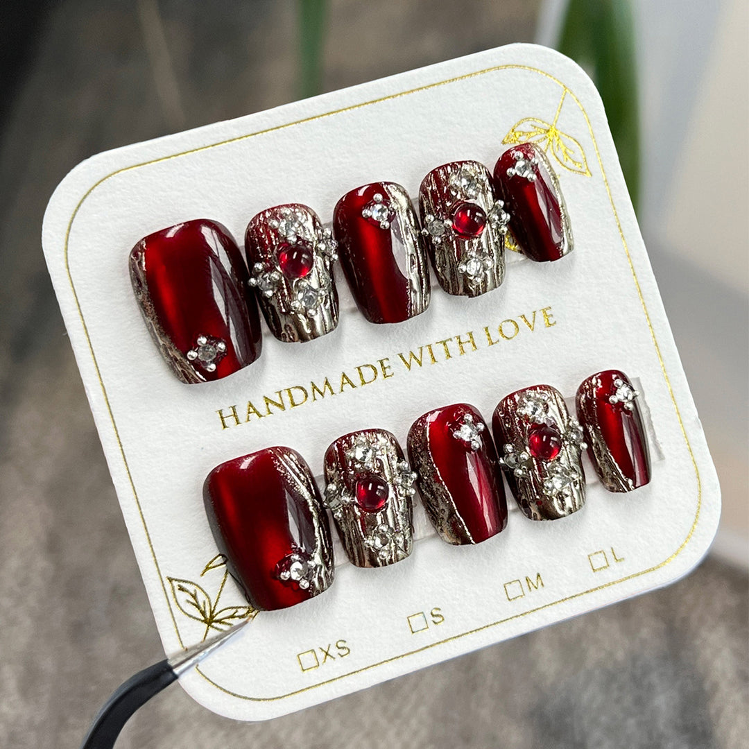 Artistic artificial nails in elegant design with glitter accents Bowlift