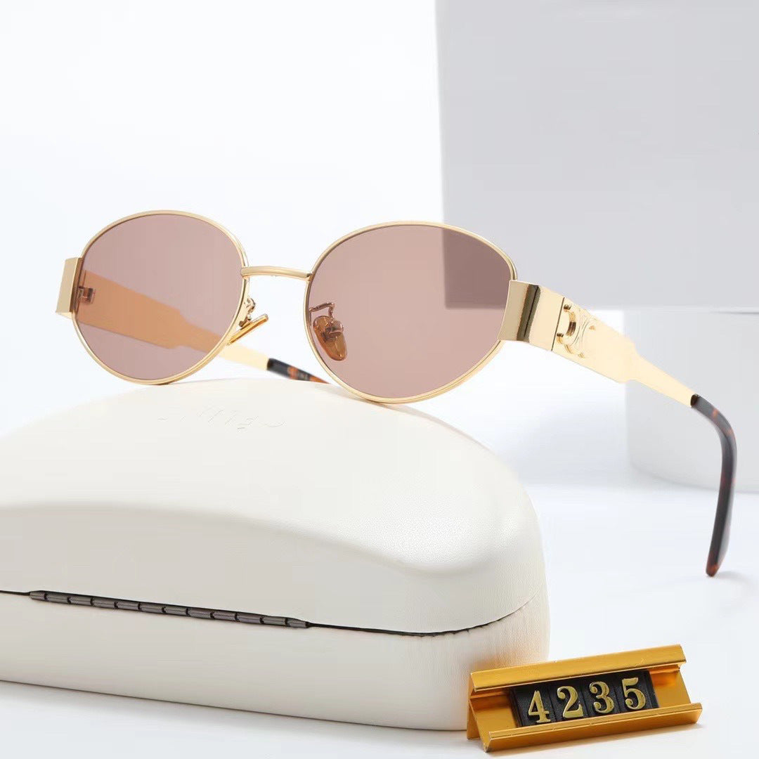 Women elegant oval sunglasses with gold-colored frame Bowlift