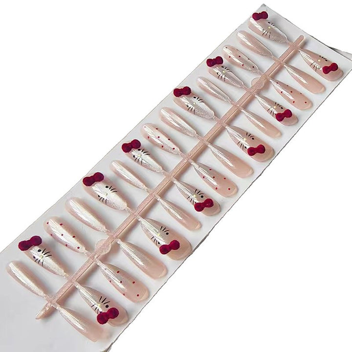 Artificial nails with playful Hello Kitty design Bowlift