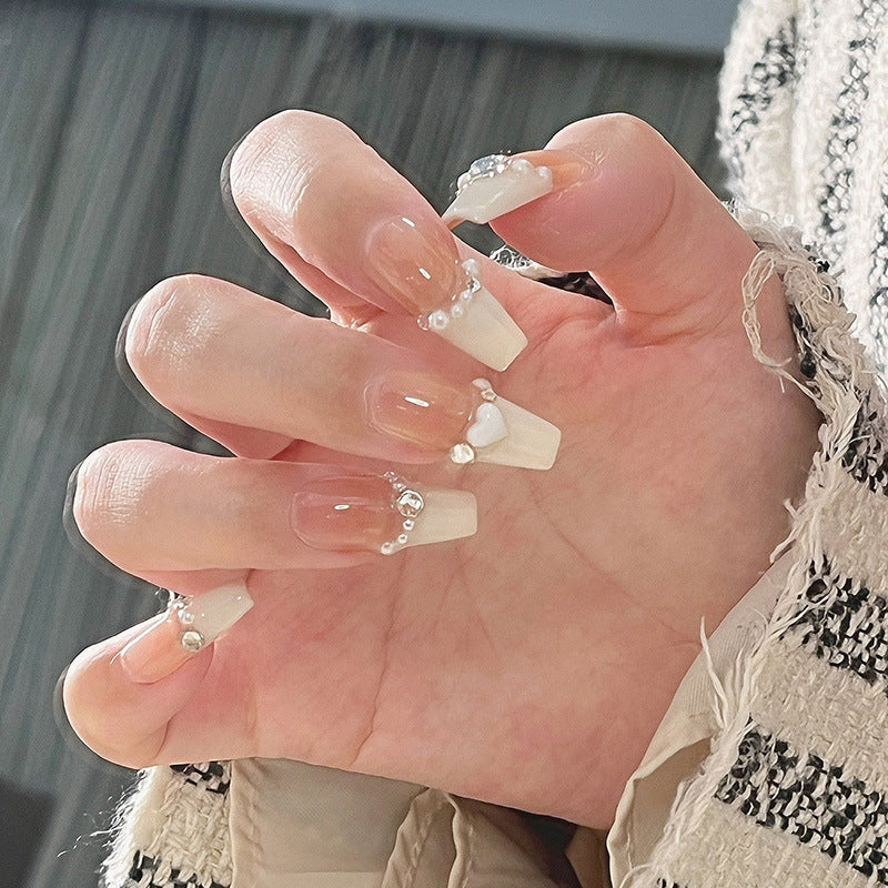 Artificial nail set with elegant flower and glitter decorations Bowlift