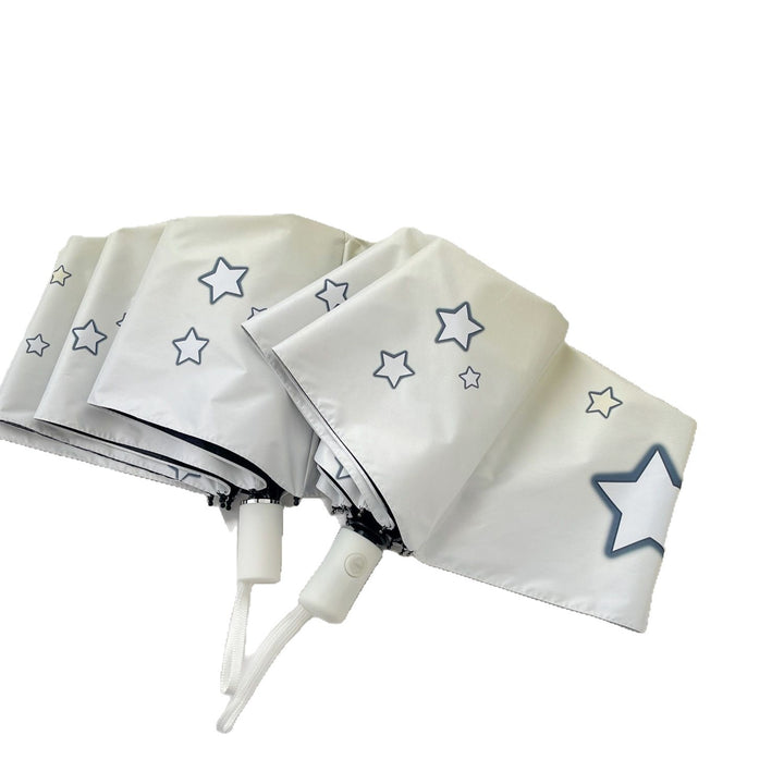 Women's compact folding umbrella with star pattern Bowlift