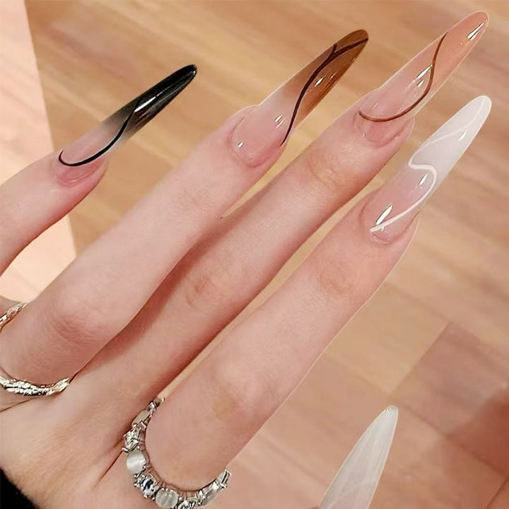 Artistic Long Stiletto Nail Enhancements Bowlift