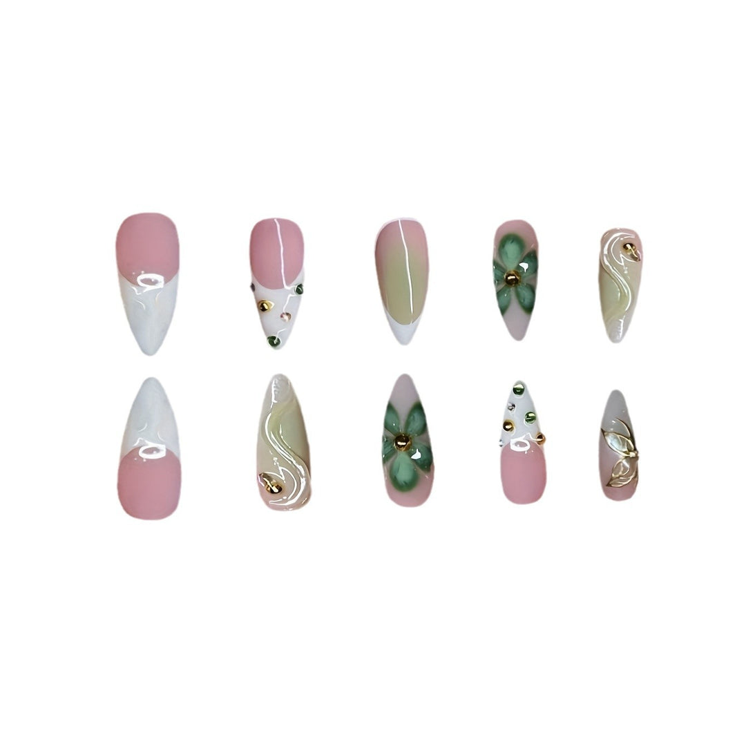 Artistic Press-On Nail Design with Floral Elements Bowlift