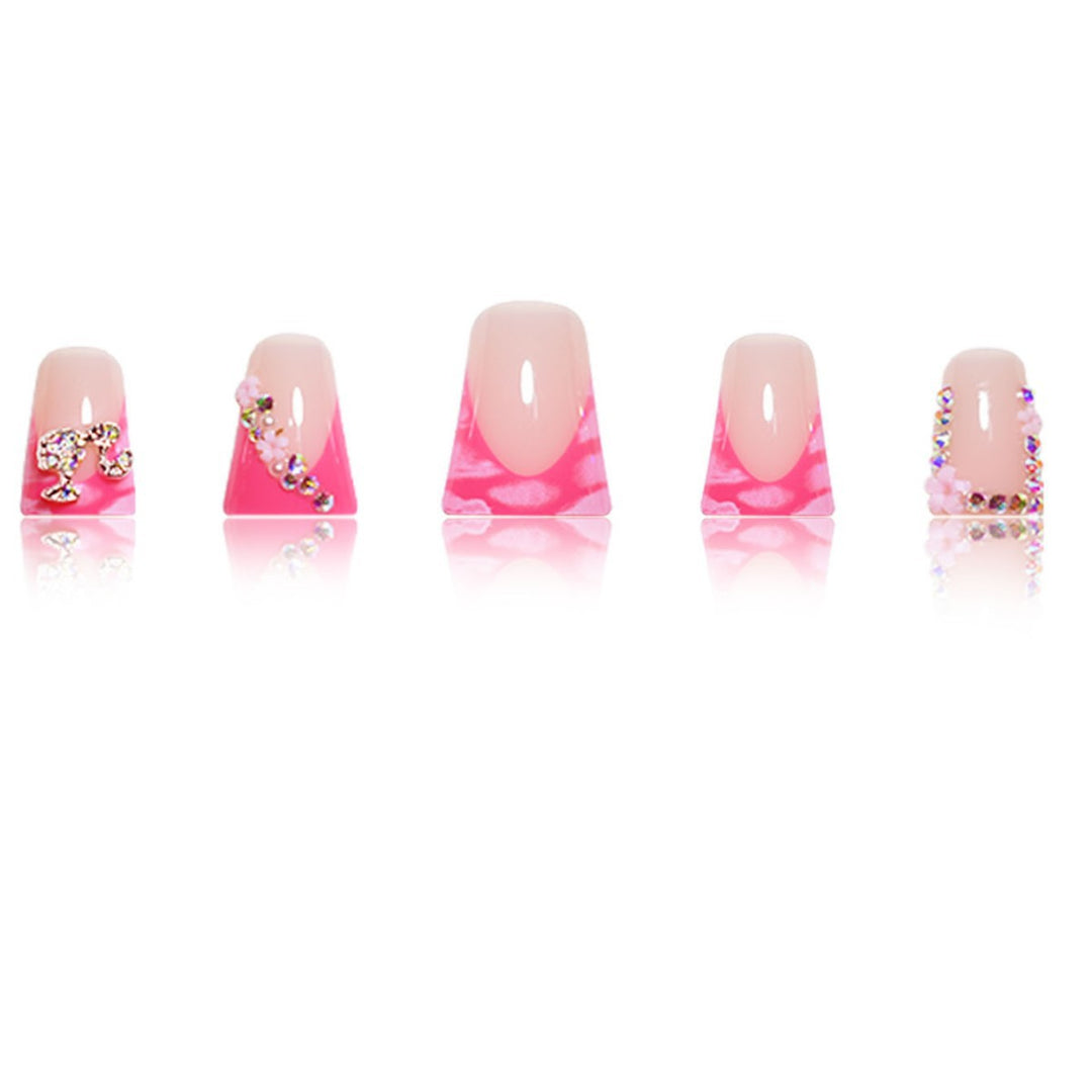 Artistic Press-On Nail Extensions with Rhinestone Accents Bowlift
