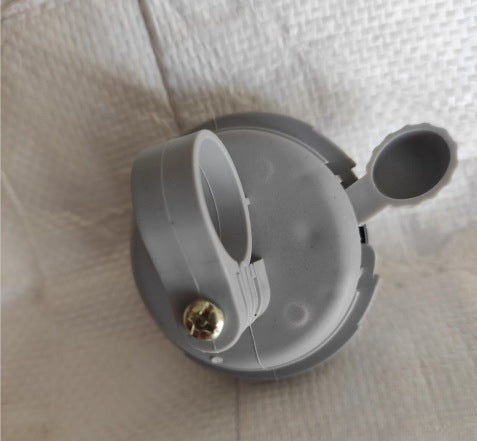 compact bicycle bell with quick-release handlebar mount Bowlift