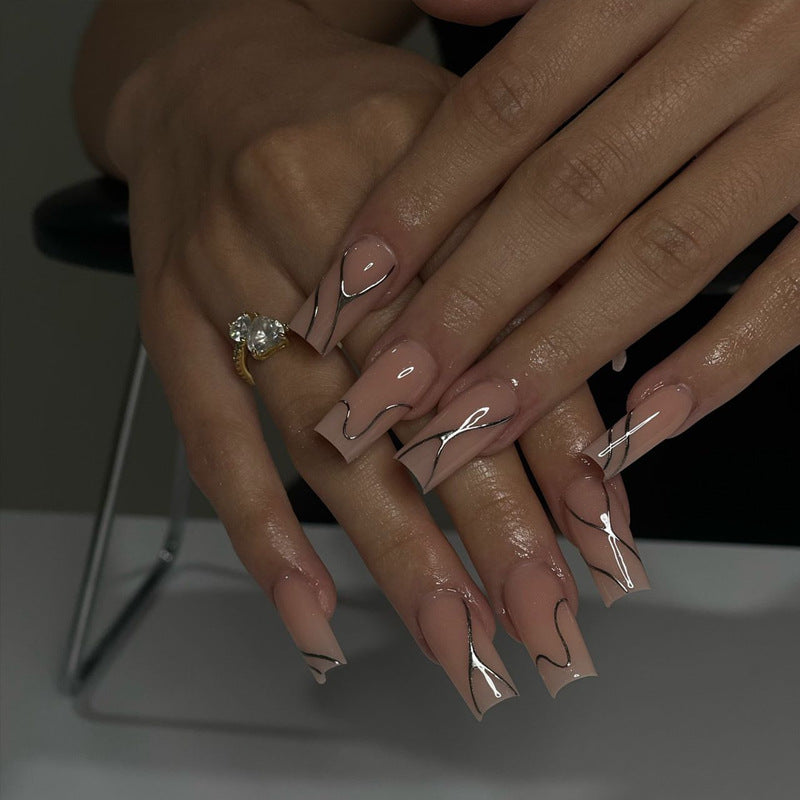 Artistic Press-On Nail Design with Elegant Graphical Accents Bowlift