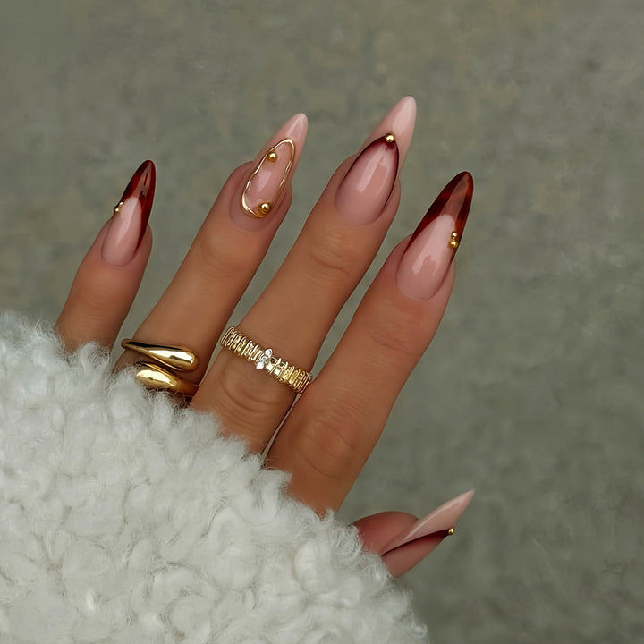 Stiletto Press-On Nail Art Set with Elegant Gold Accents Bowlift