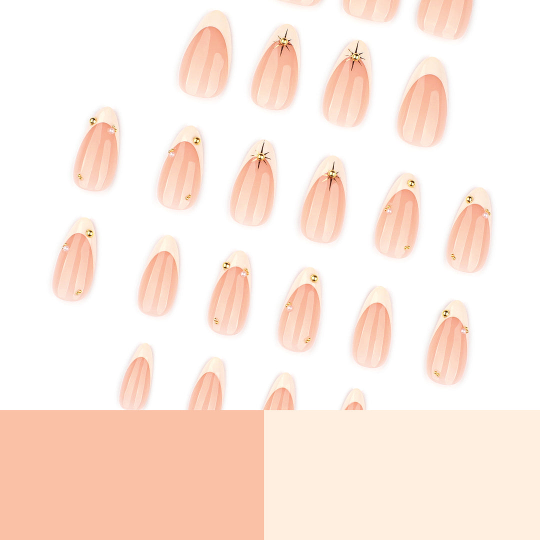 Artistic French-tip nail art with glitter and elegant embellishments Bowlift