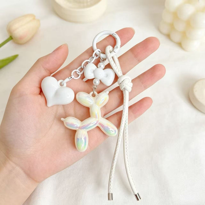Playful keychain with heart and balloon dog Bowlift