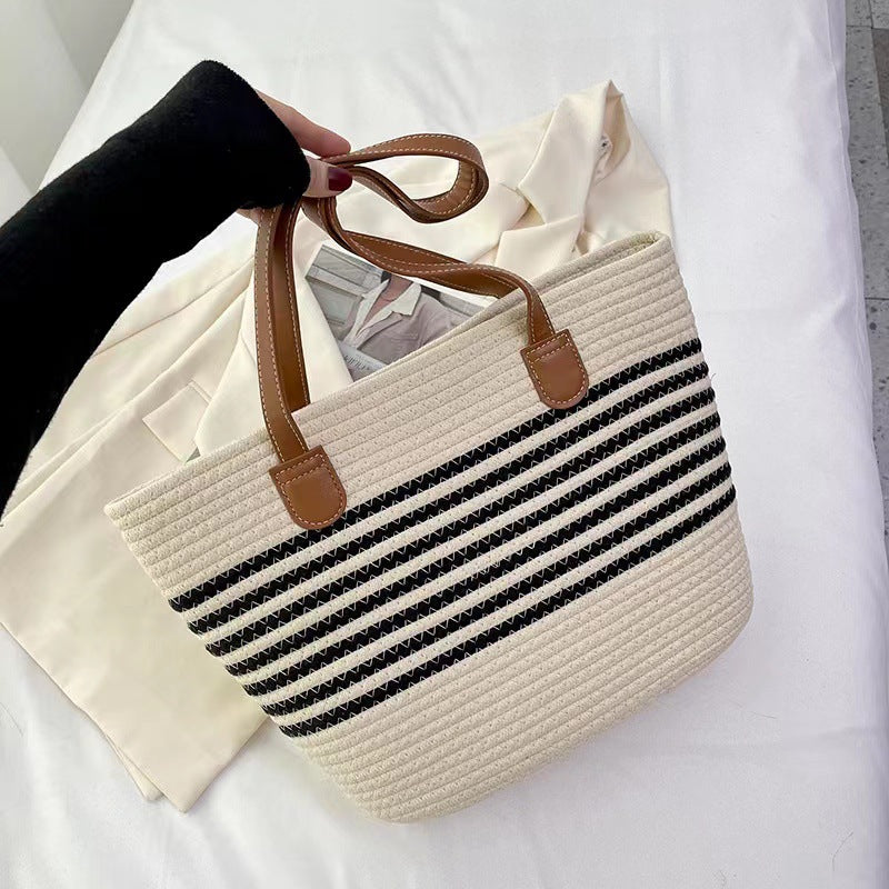 Elegant Tote Bag Made of Woven Bast Material with Robust Leather Accents Bowlift