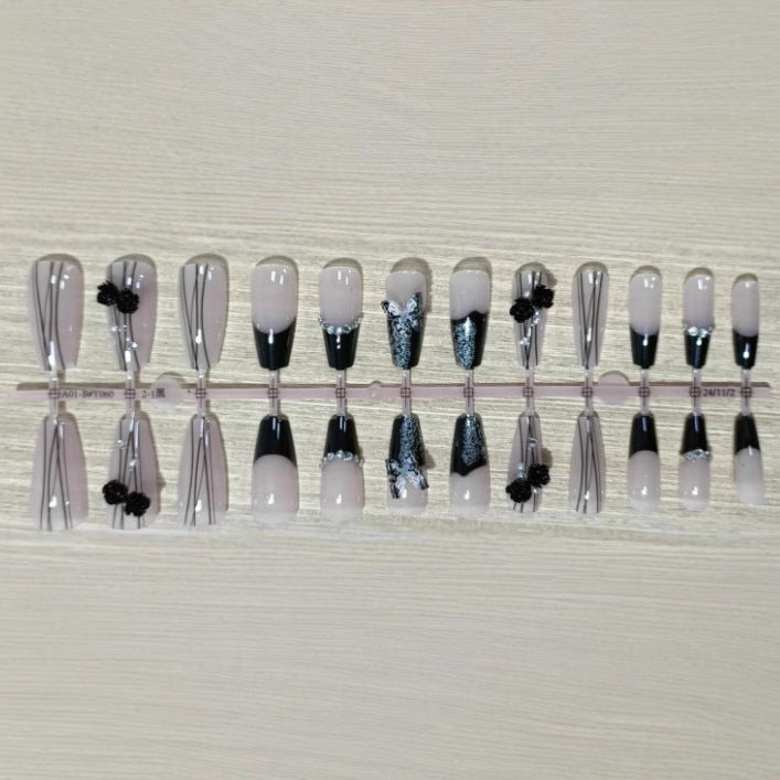 Elegant nail design with bow and rhinestone details Bowlift