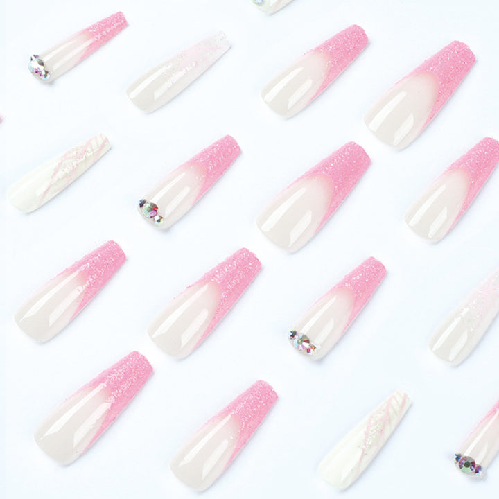 Artistic stiletto nails with glitter and snowflake design Bowlift