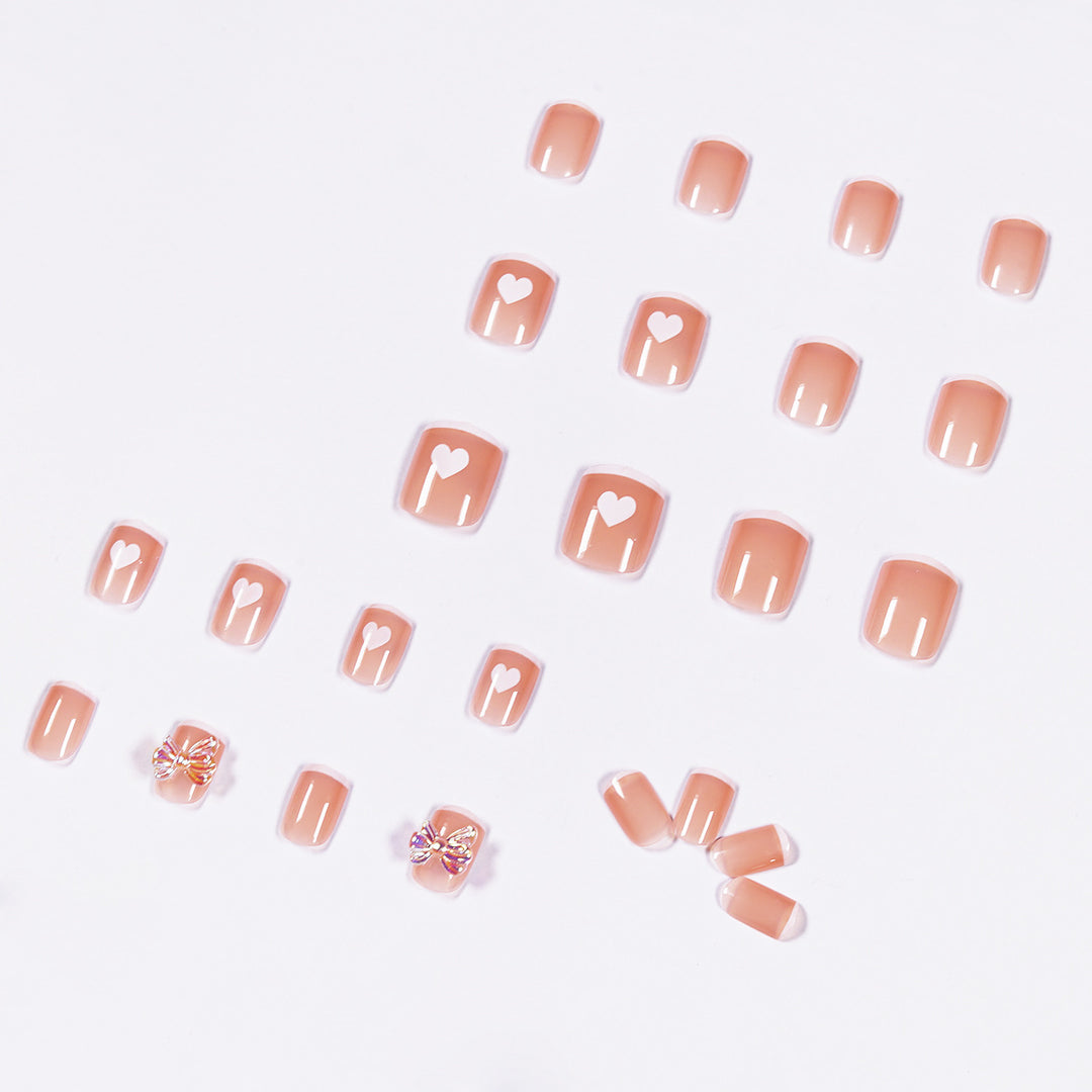 Nail art with heart and butterfly motifs Bowlift