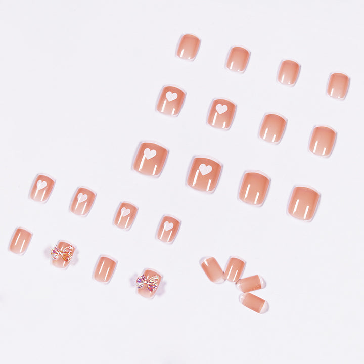 Nail art with heart and butterfly motifs Bowlift