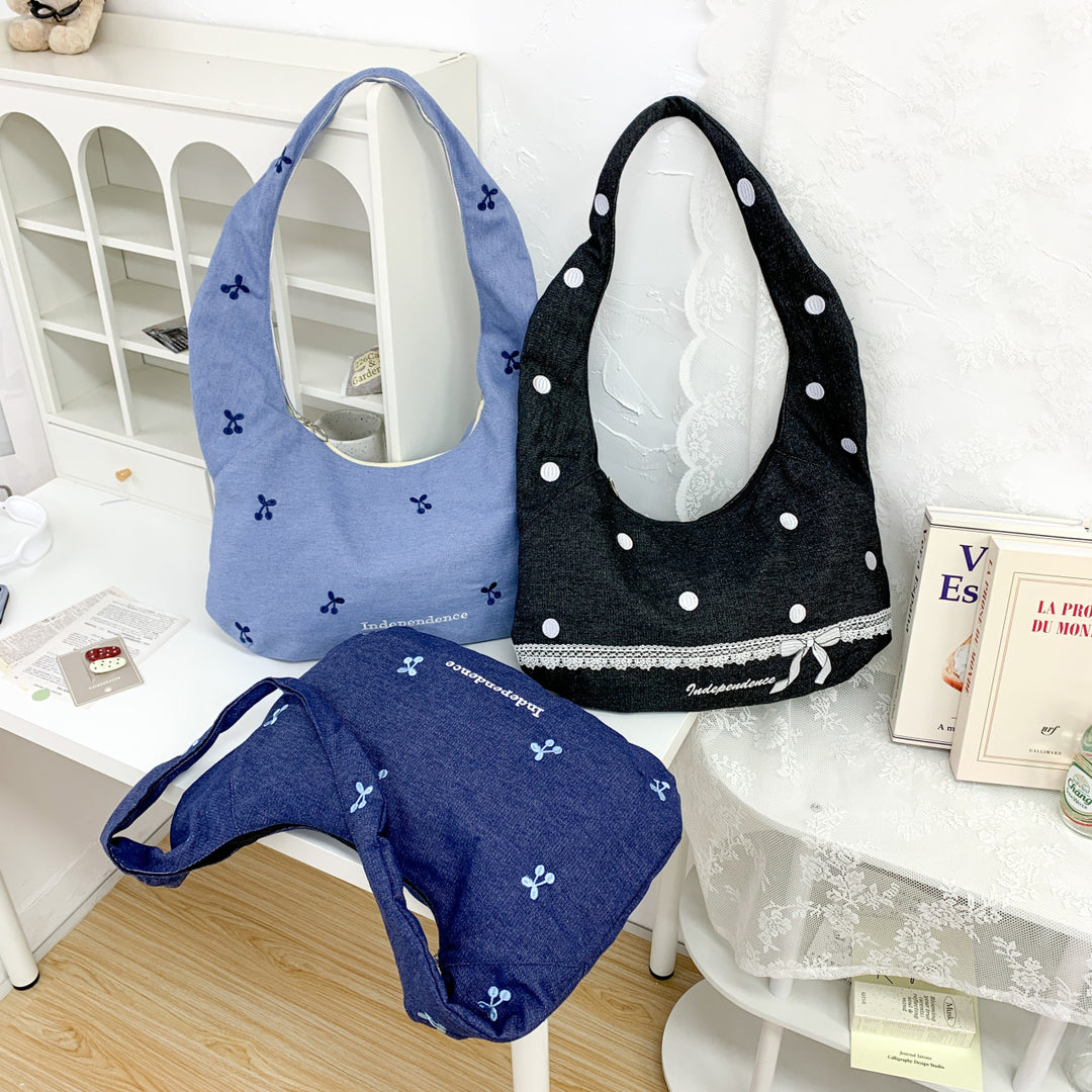 Comfortable shoulder bag with original embroidery motif Bowlift