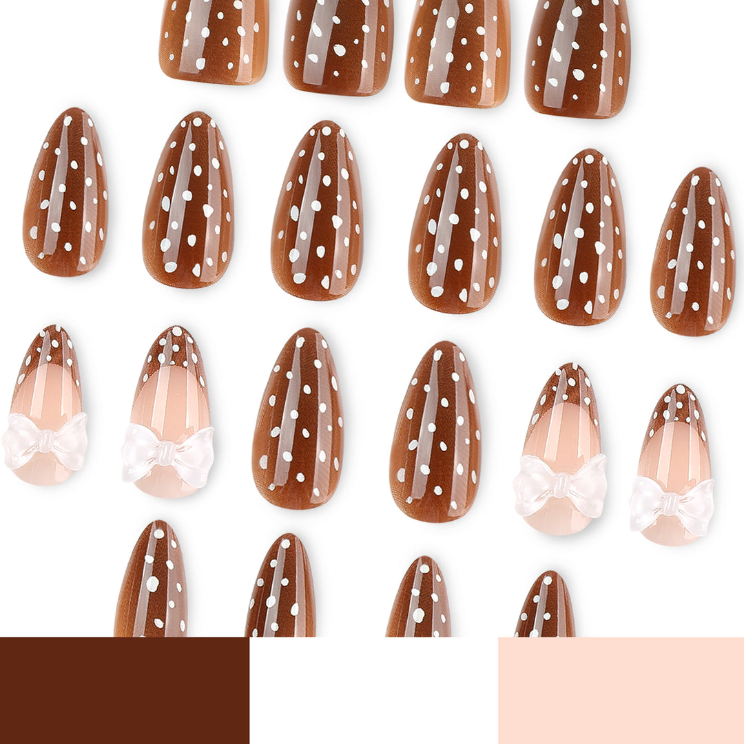Artistic stiletto nails with delicate bow motif Bowlift