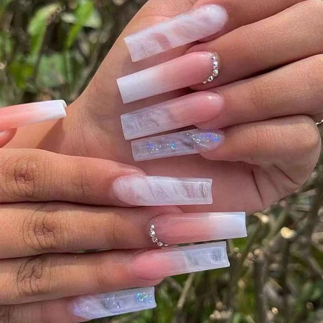 Artificial nail set with glamorous 3D accents and transparent design Bowlift