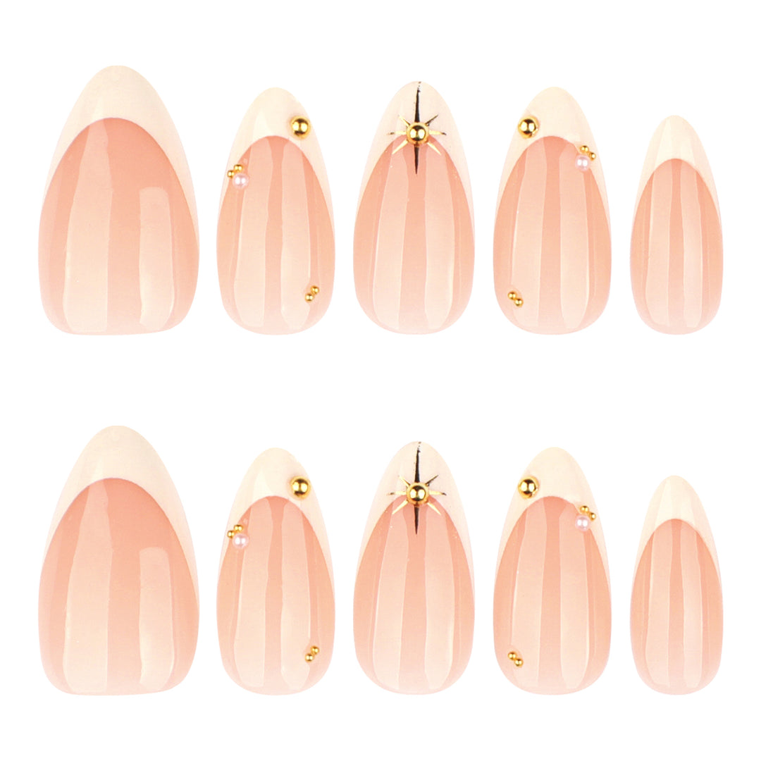 Artistic French-tip nail art with glitter and elegant embellishments Bowlift