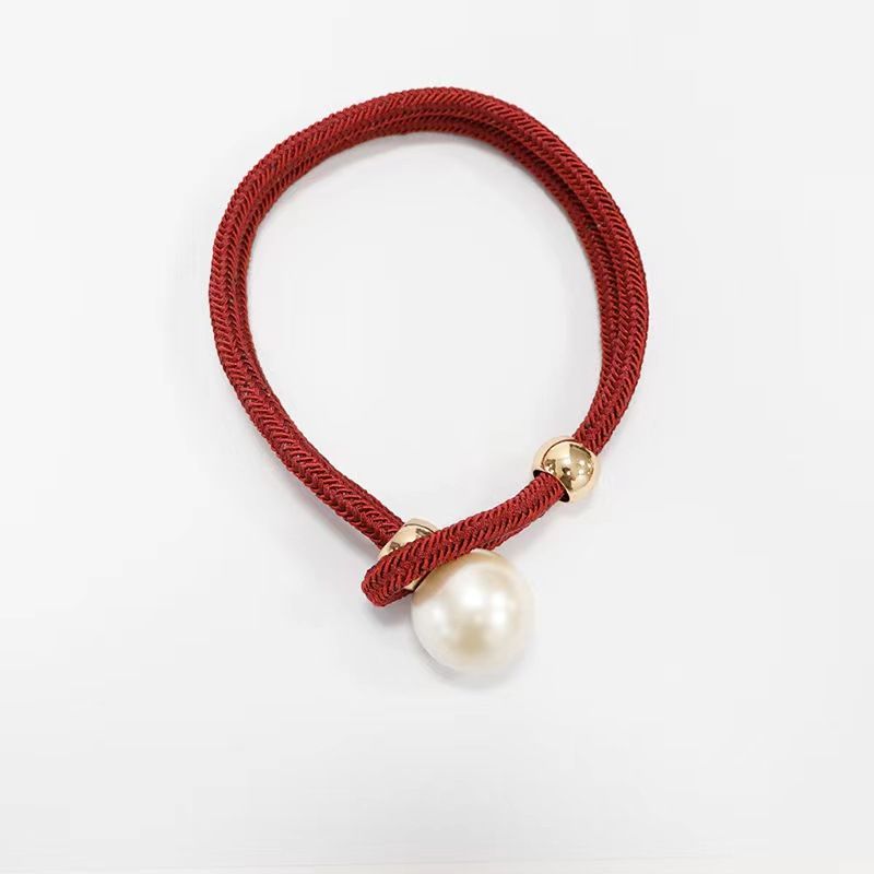Elegant curtain tieback with decorative pearl Bowlift