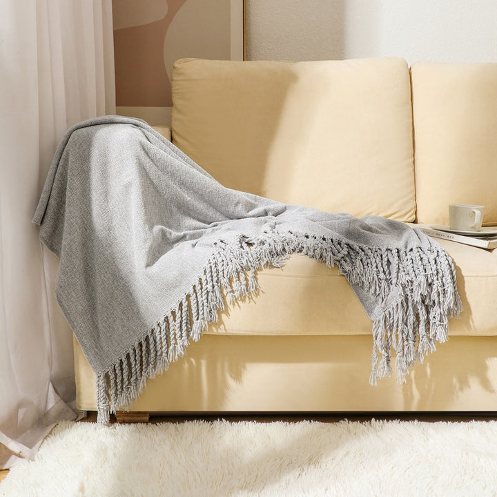 Ladies elegant and stylish couch blanket with fringes Bowlift