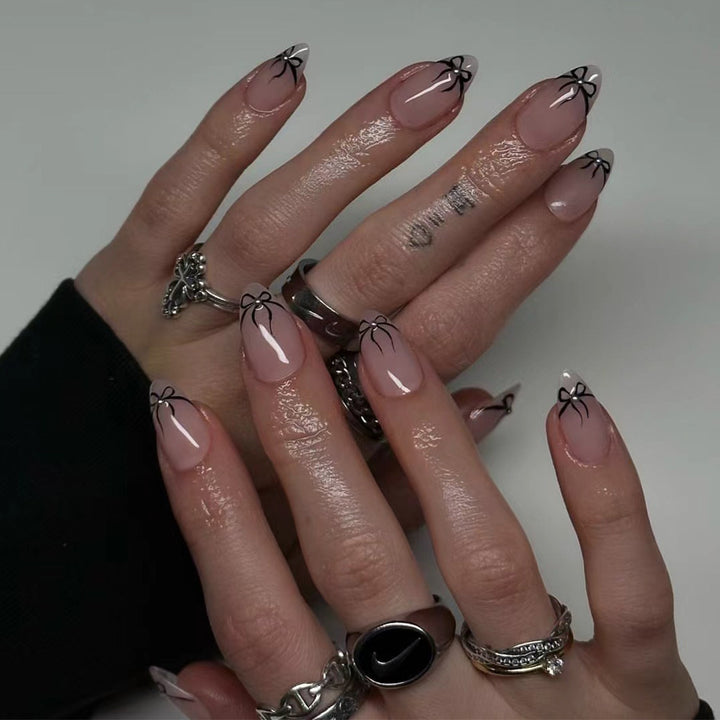 Artful nail art with elegant bow designs Bowlift