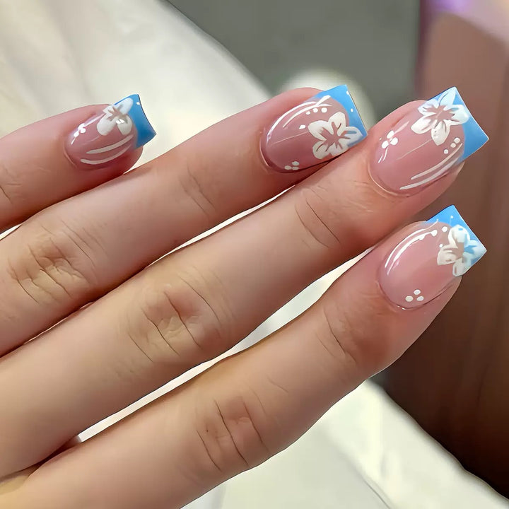 Acrylic nail set with floral designs and elegant tips Bowlift