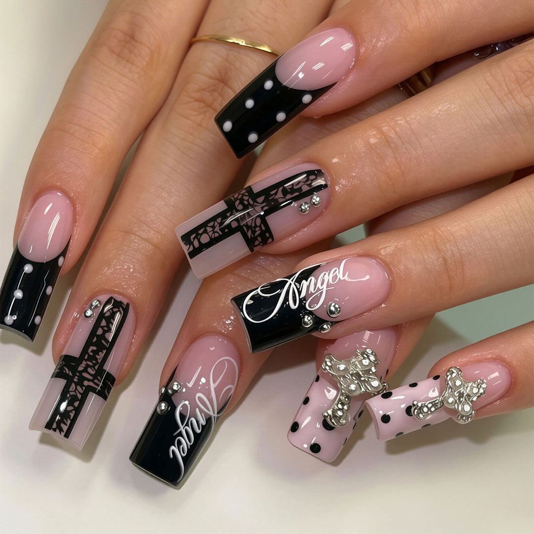 Artistic Long Press-On Nail Design Set with Cross Accents Bowlift