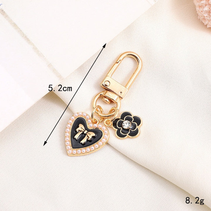Playful keychain with teddy bear motif Bowlift