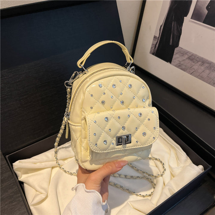 Quilted Mini Backpack with Rhinestone Accents Bowlift