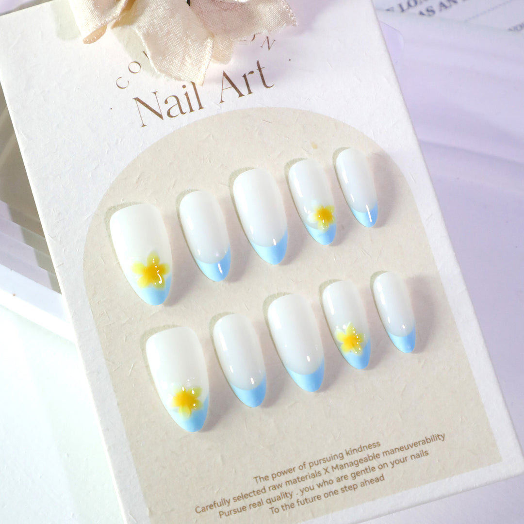 Artfully designed nail extensions with floral accent Bowlift