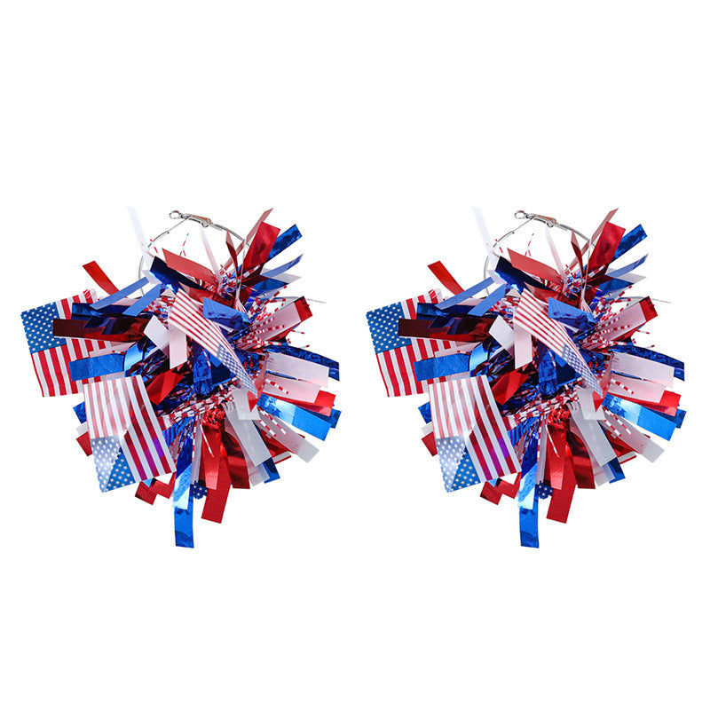 Women with eye-catching pompom hoops with lametta tassels and lightweight wire closure Bowlift