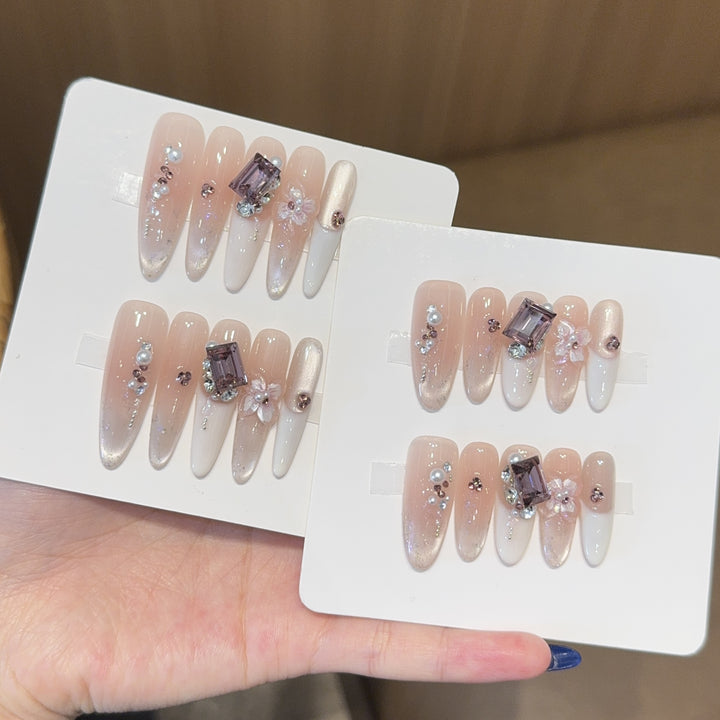 Artificial nails with elegant jewelry details Bowlift