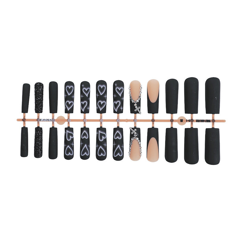 Artificial nail set with elegant glitter and heart designs Bowlift