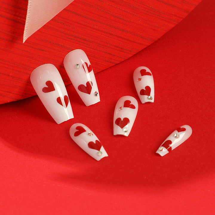 Artful Nail Extensions with Romantic Heart Designs Bowlift