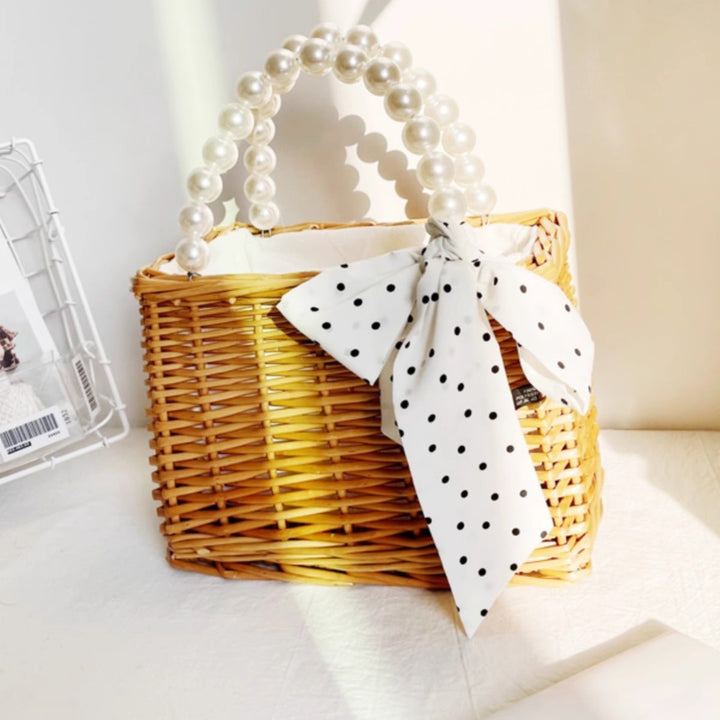 Ladies handbag made of braided material with elegant pearl handles Bowlift