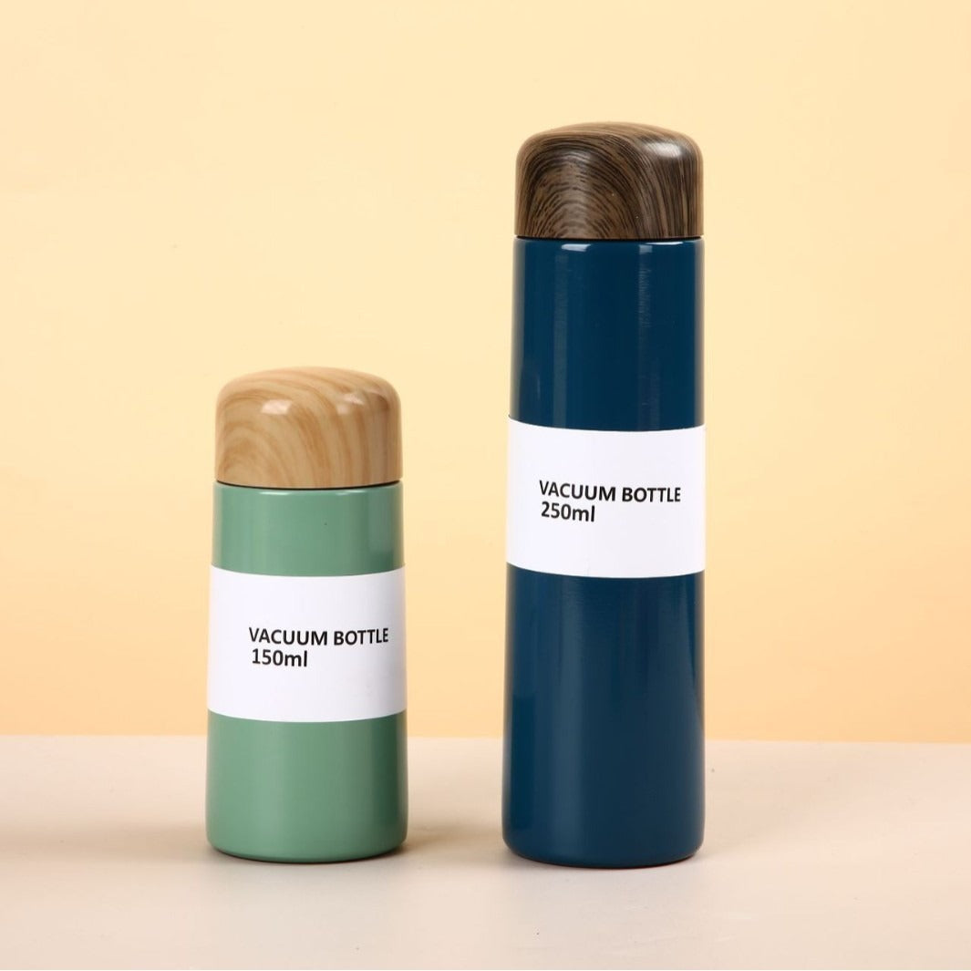 Women vacuum-insulated water bottle with innovative wooden lid Bowlift